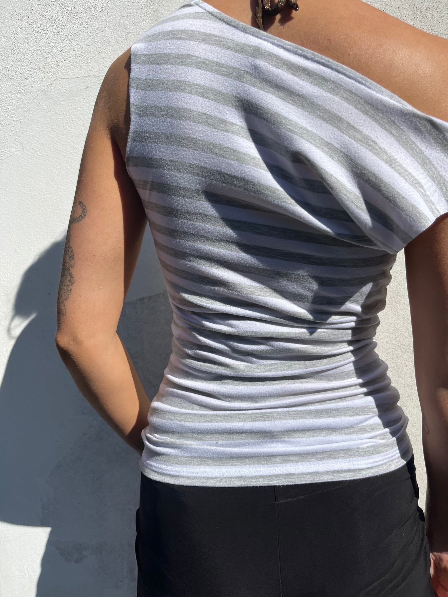 white and grey stripy top