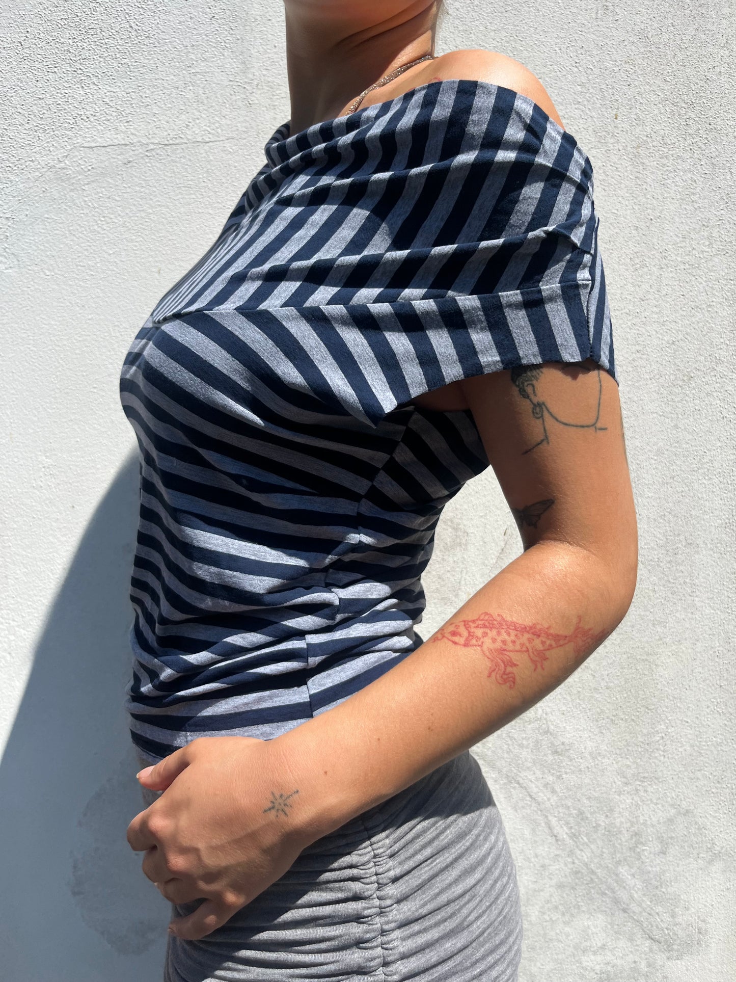 asymmetric stripy top