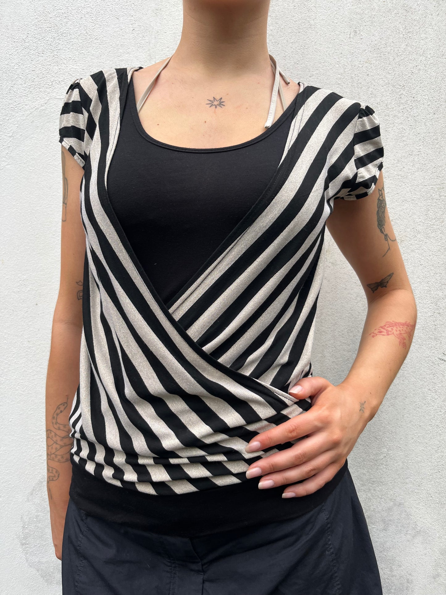 gold and black stripy top