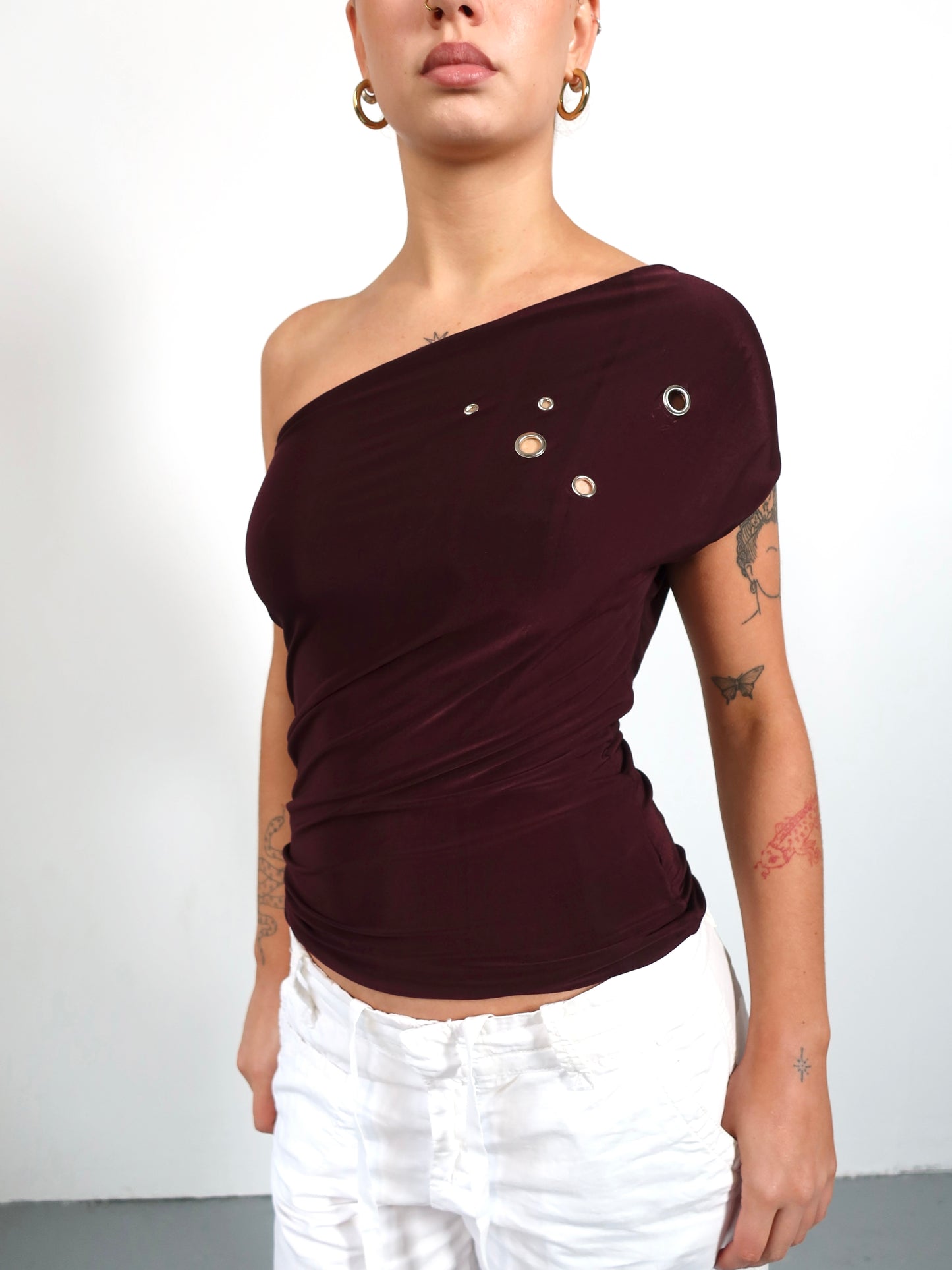 one shoulder eyelet top in plum