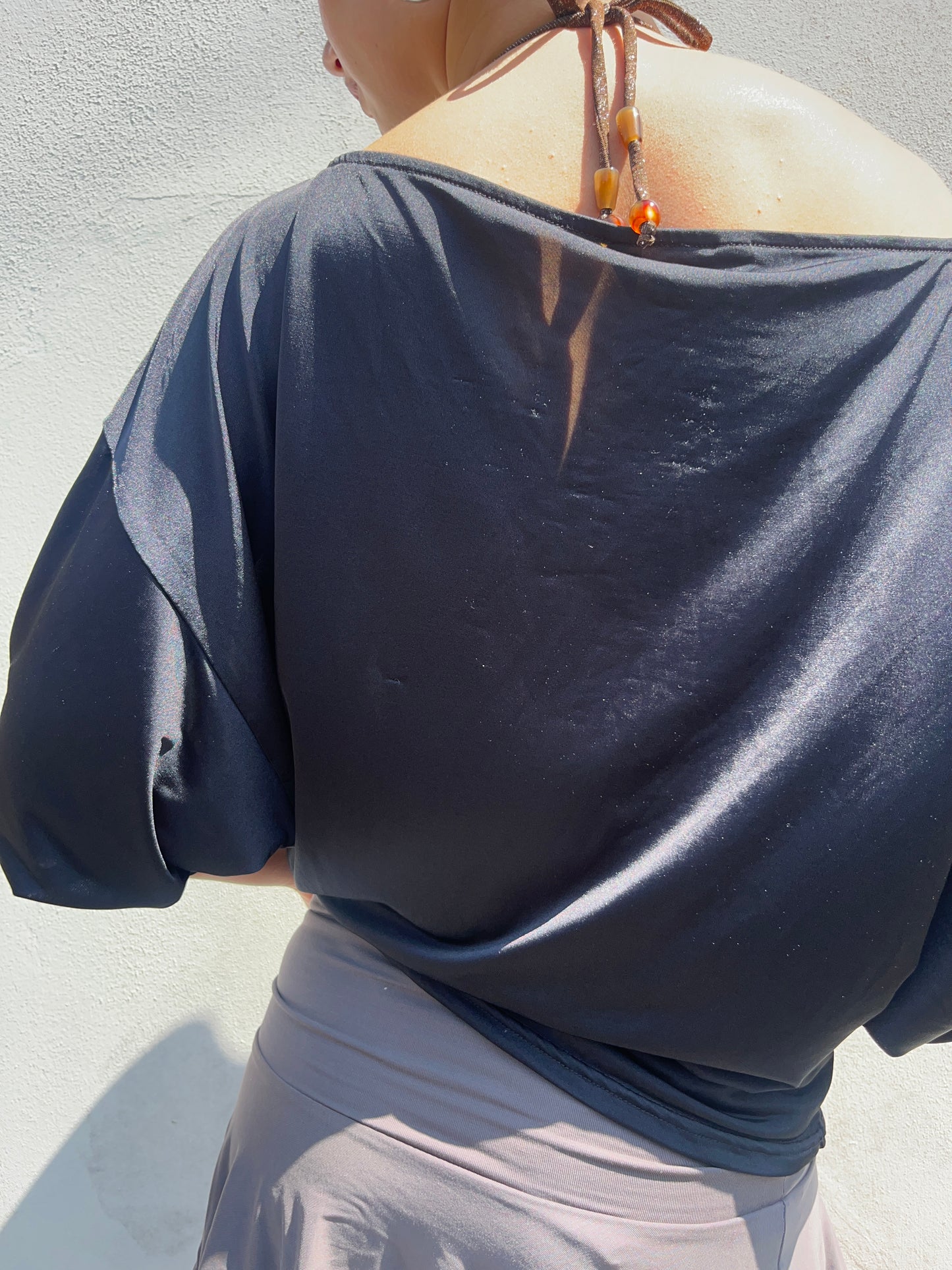 black slinky batwing top