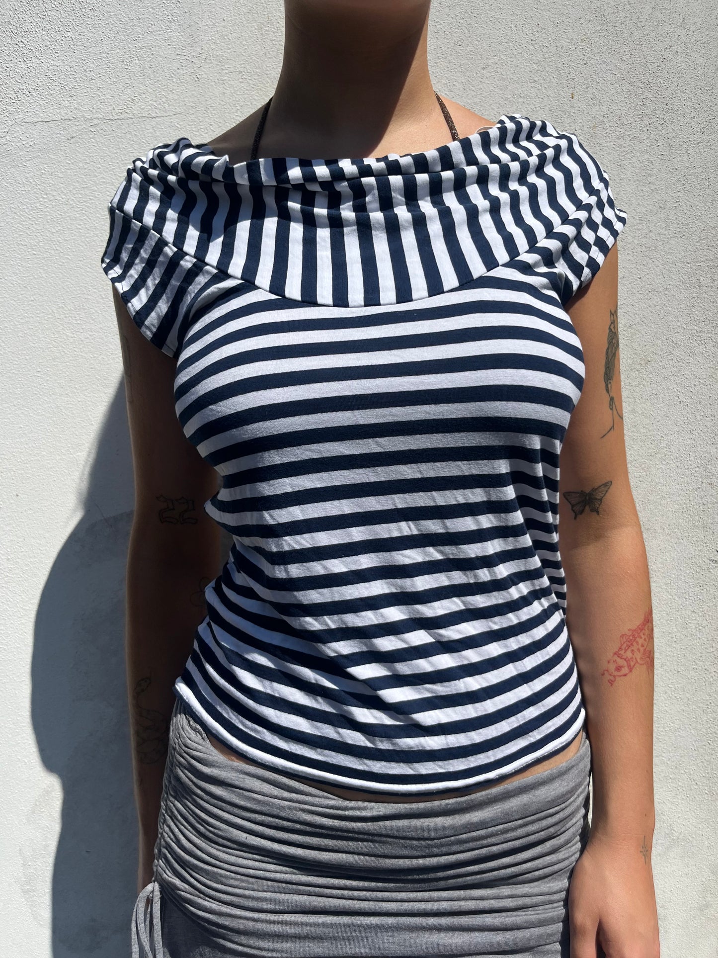 asymmetric stripy top