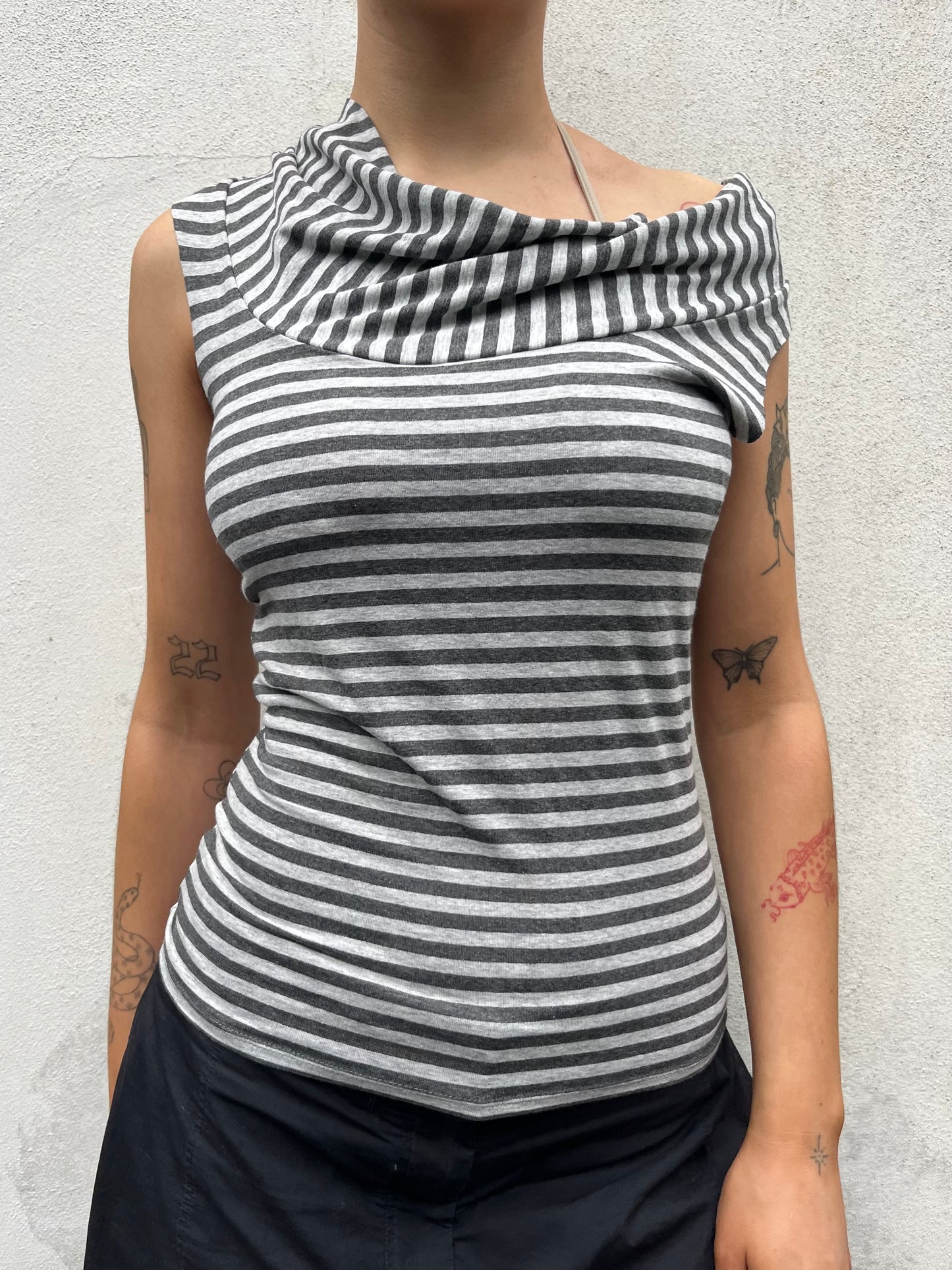 asymmetric stripy top
