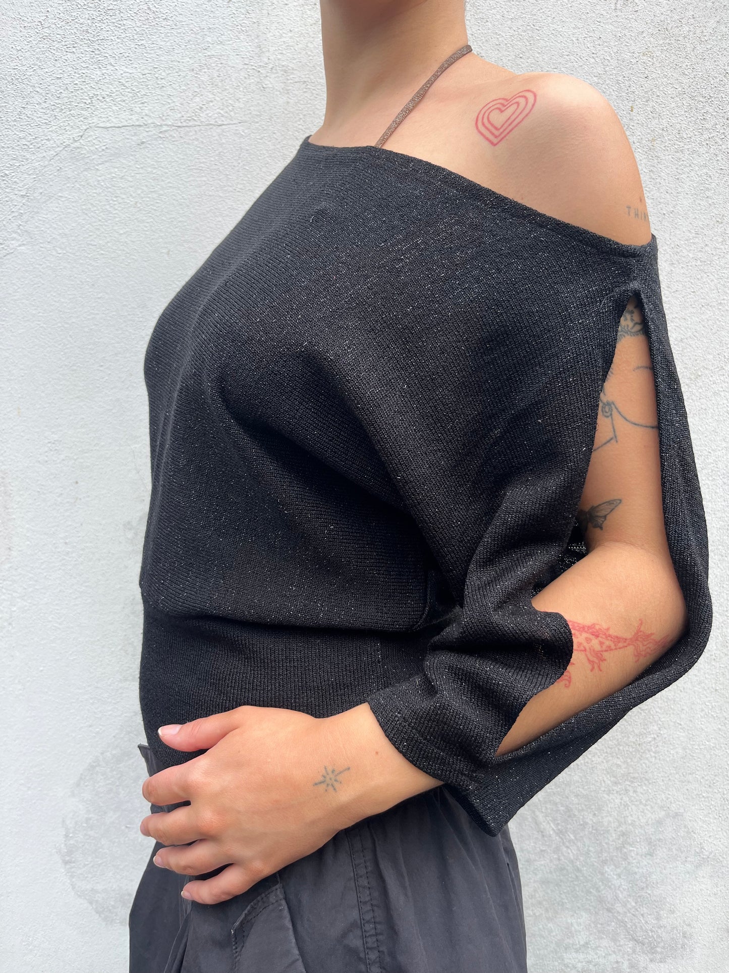 black sparkly batwing top
