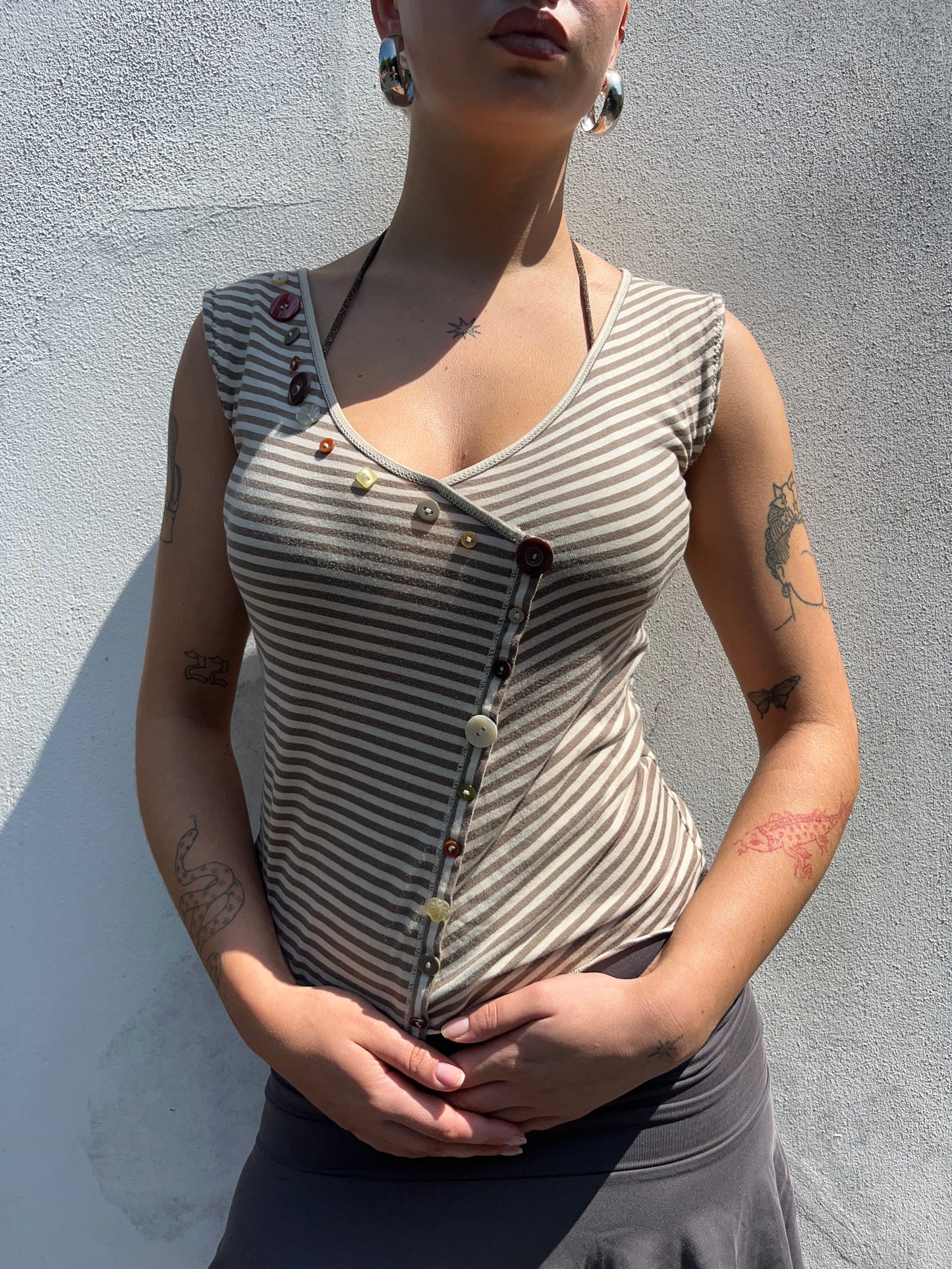 stripy asymmetric button top