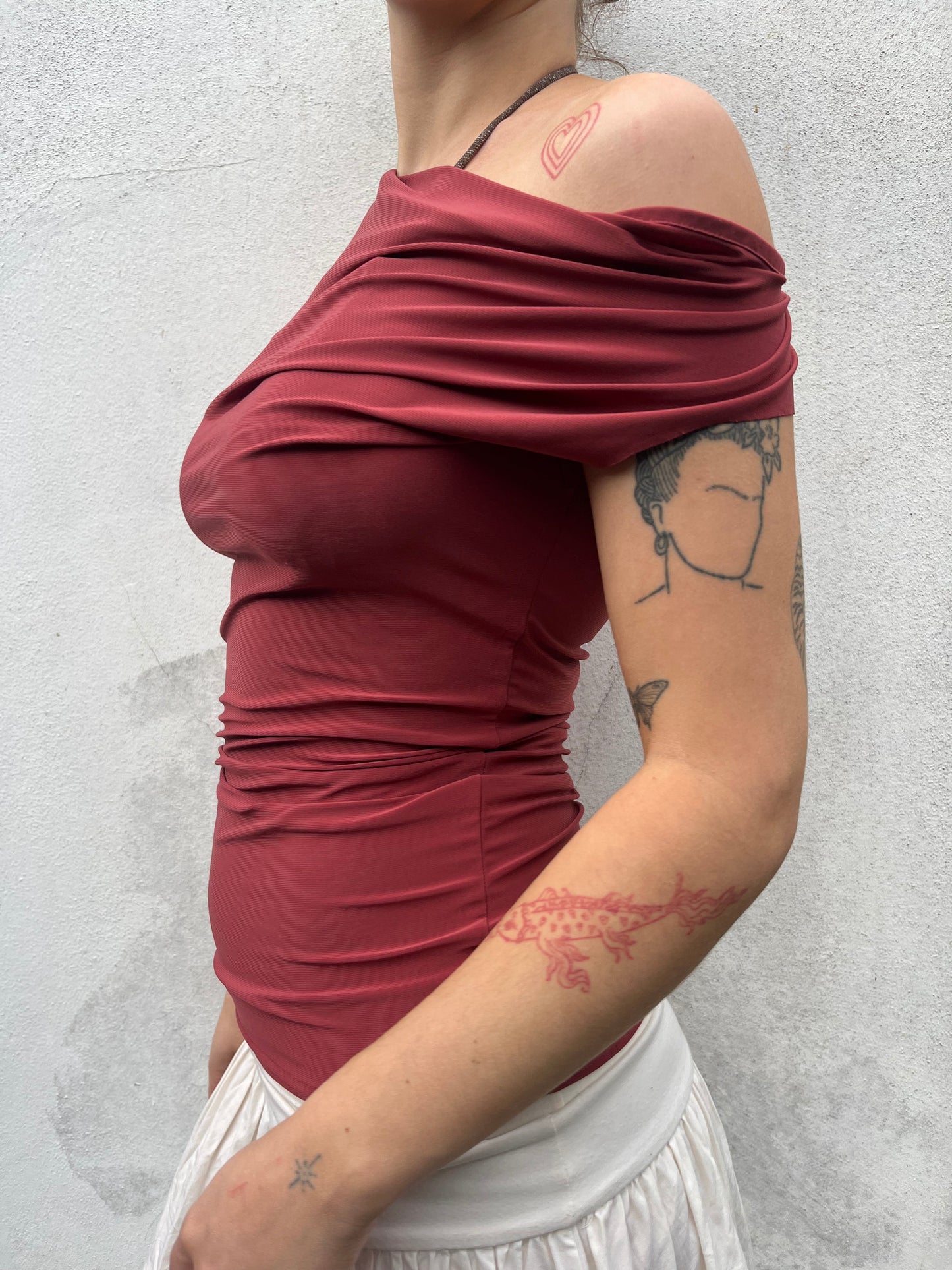 burnt orange cowl neck top