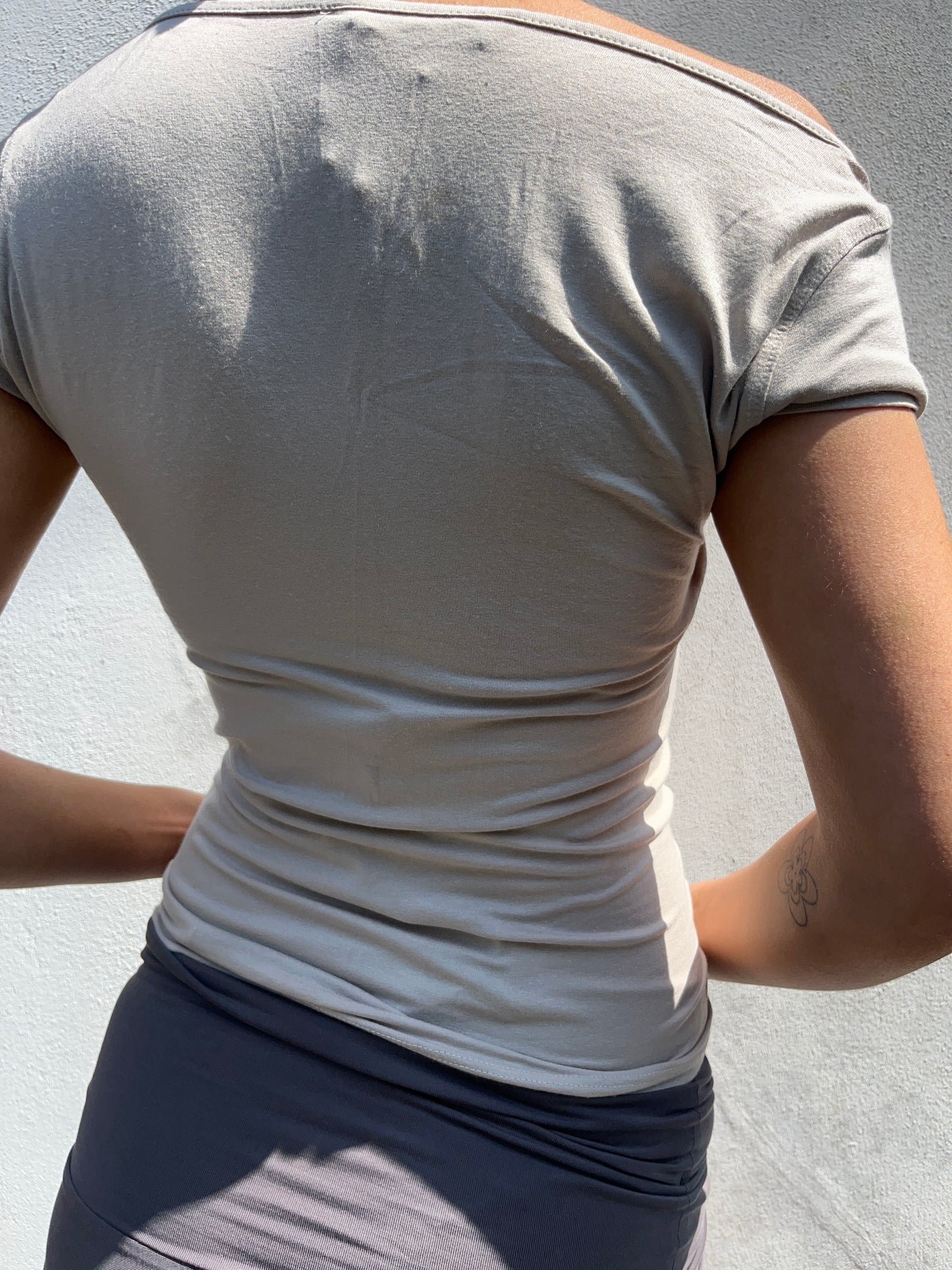 beige buckle top