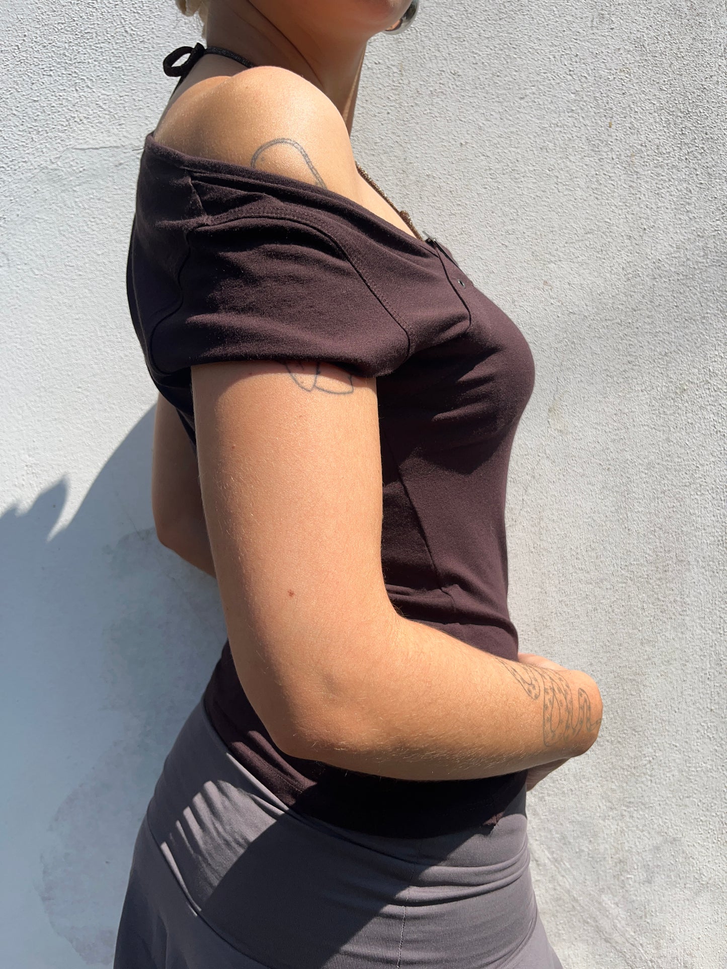 brown buckle top