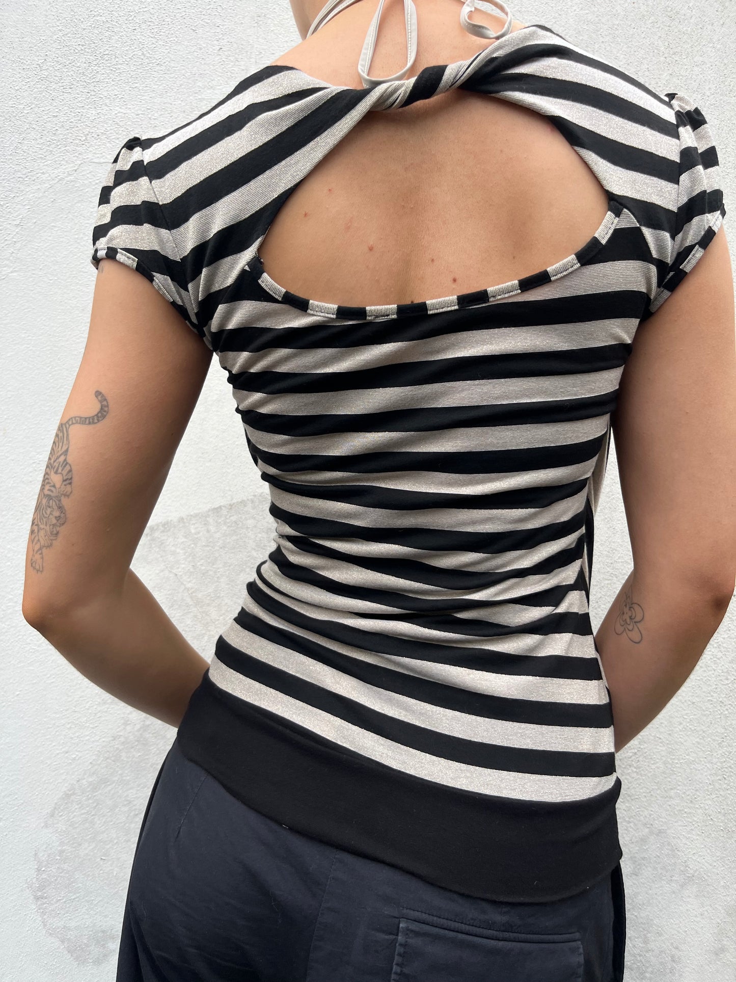 gold and black stripy top