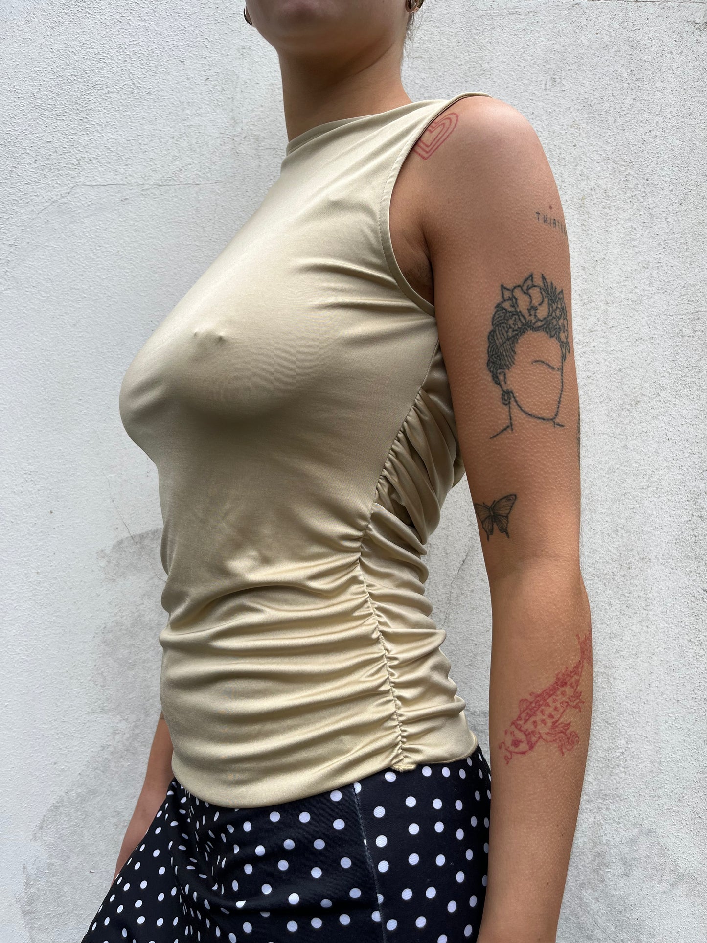 gold slinky wrap top