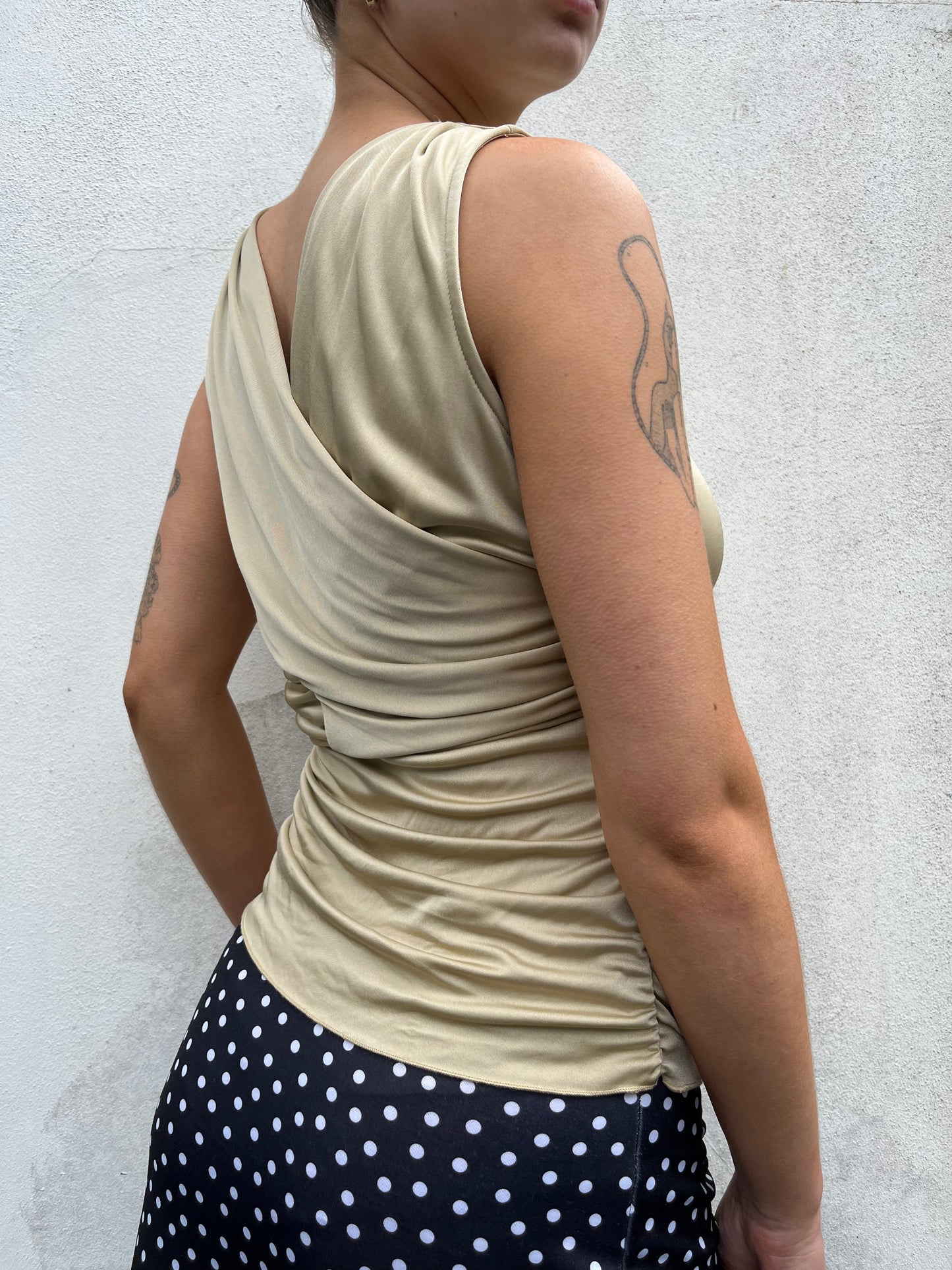 gold slinky wrap top