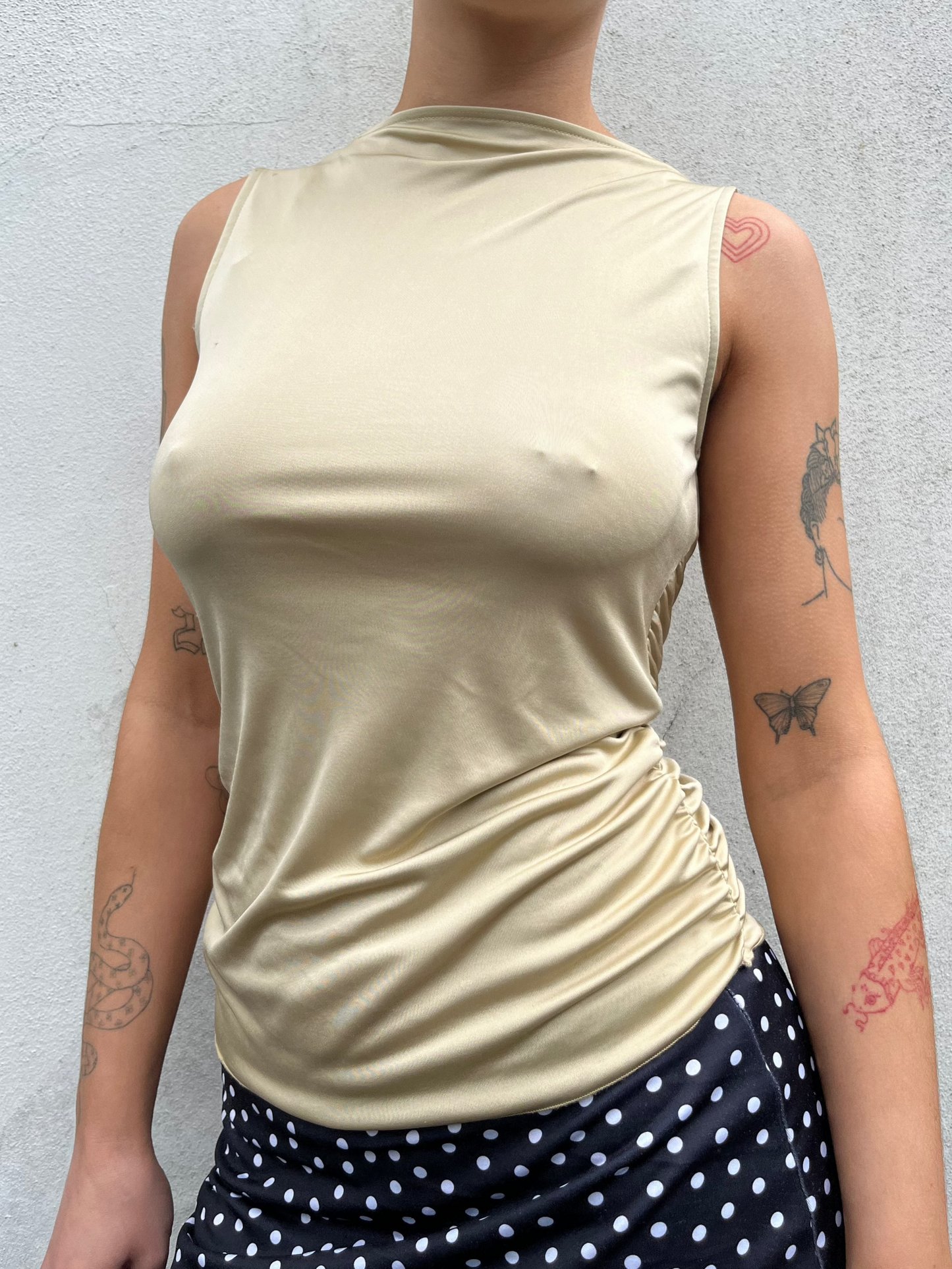 gold slinky wrap top