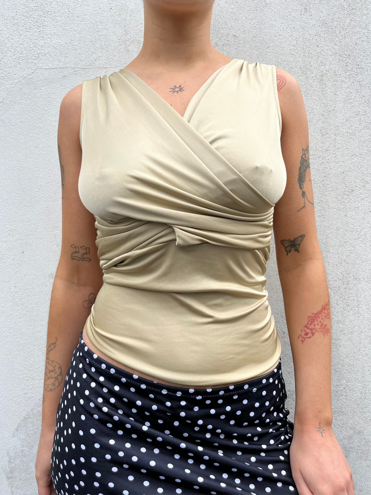 gold slinky wrap top