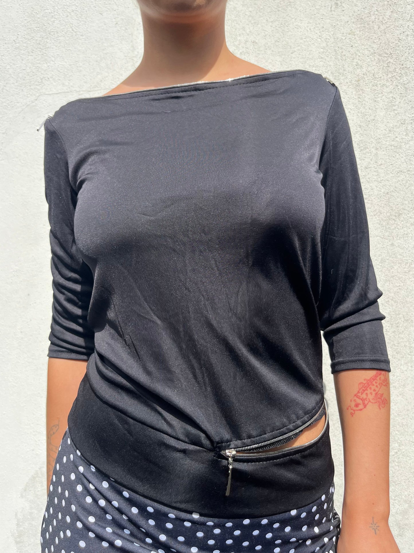 black zip top