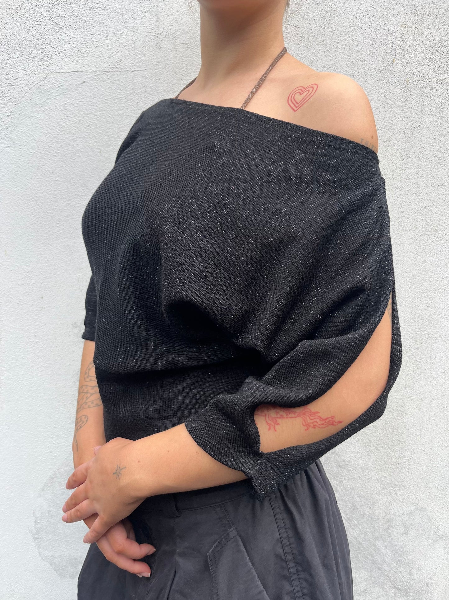 black sparkly batwing top