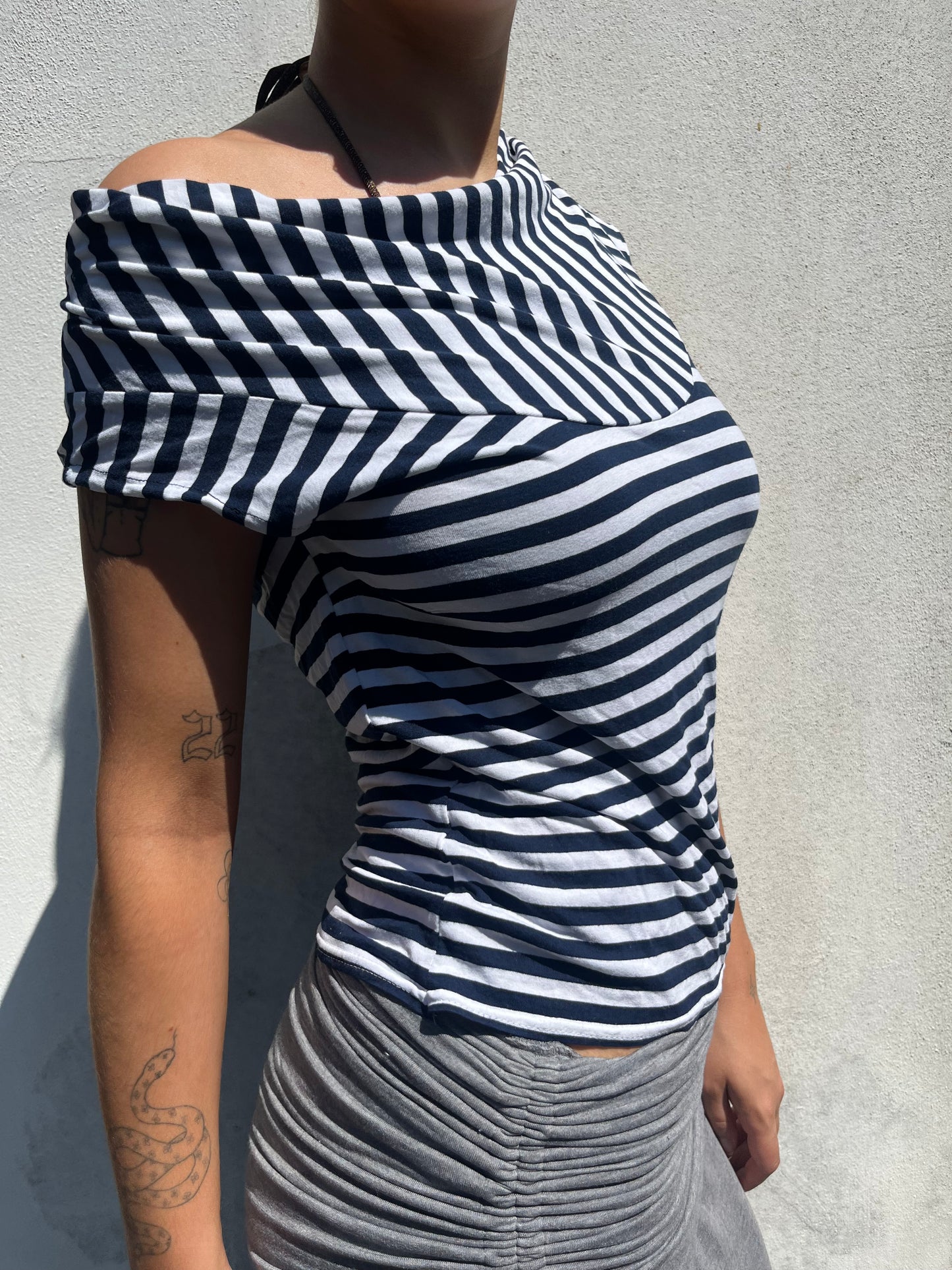 asymmetric stripy top