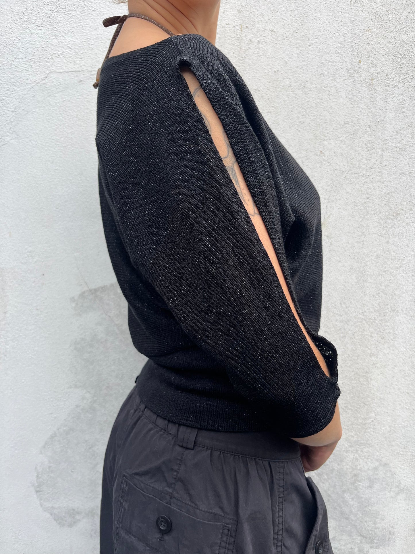 black sparkly batwing top
