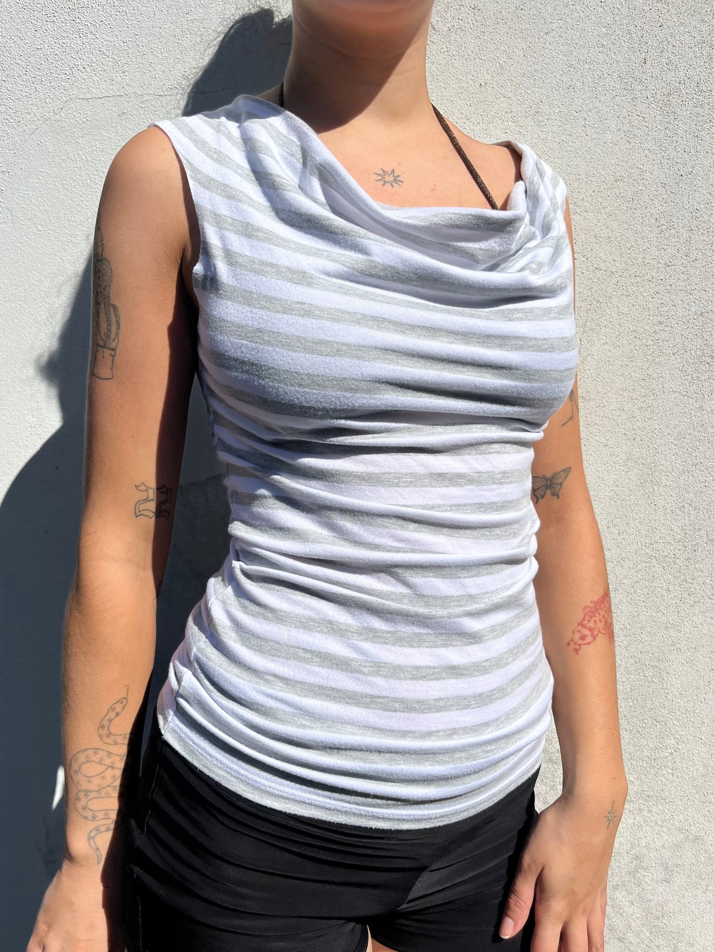white and grey stripy top