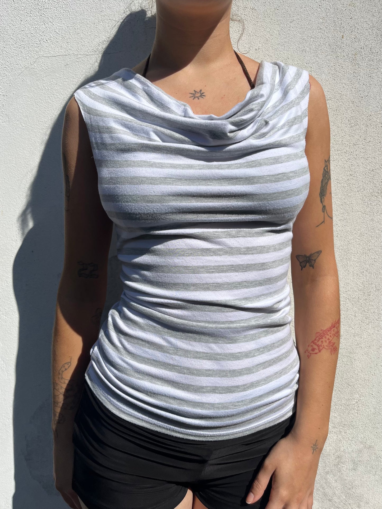 white and grey stripy top