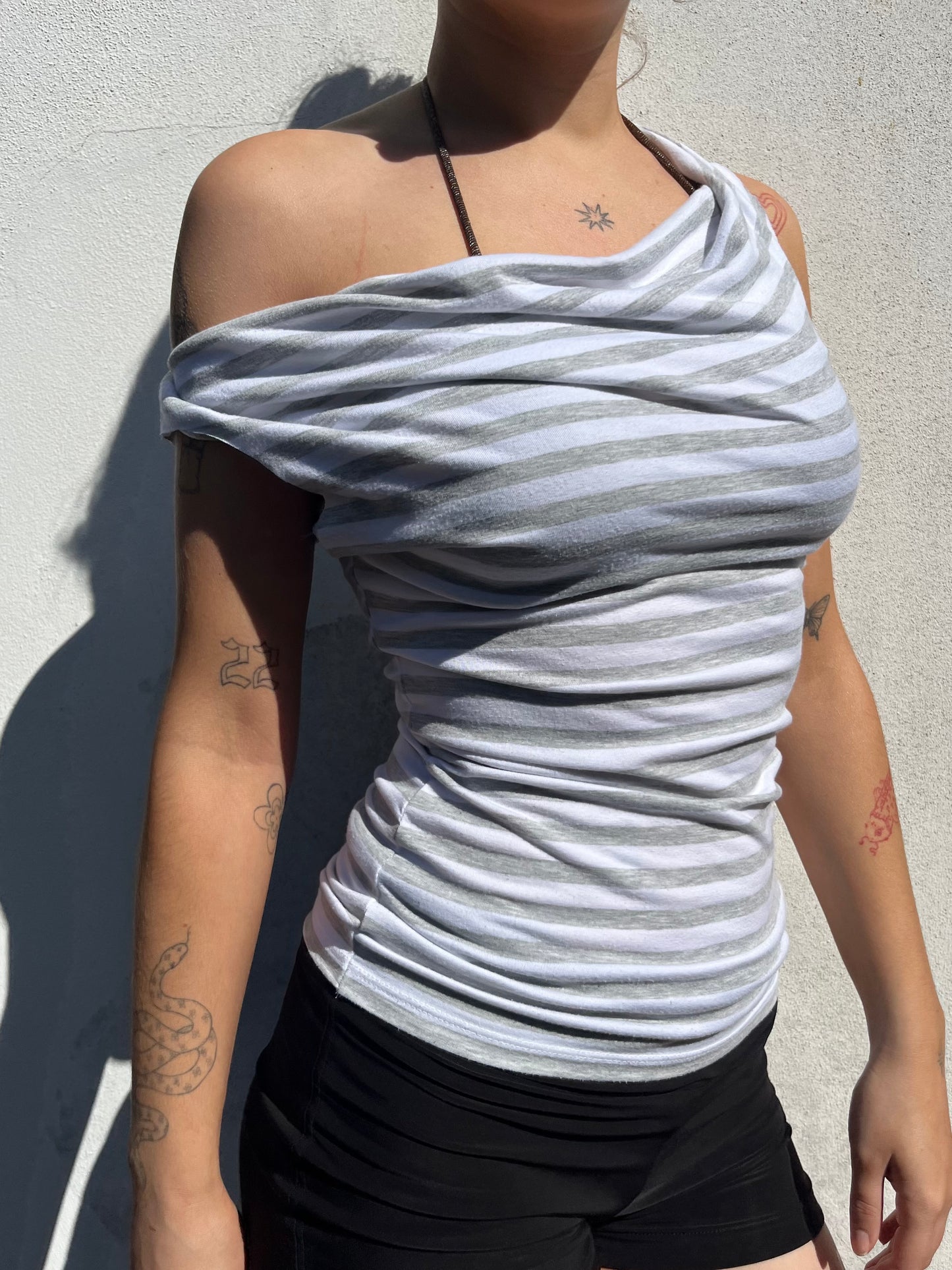 white and grey stripy top