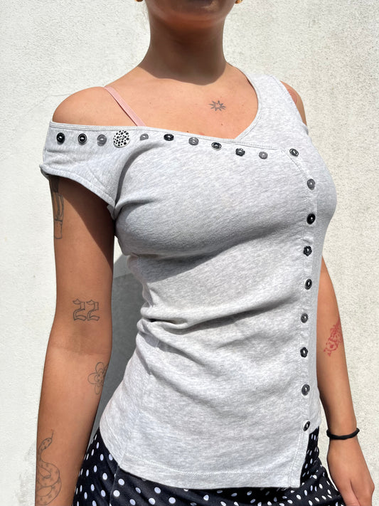 asymmetric button top