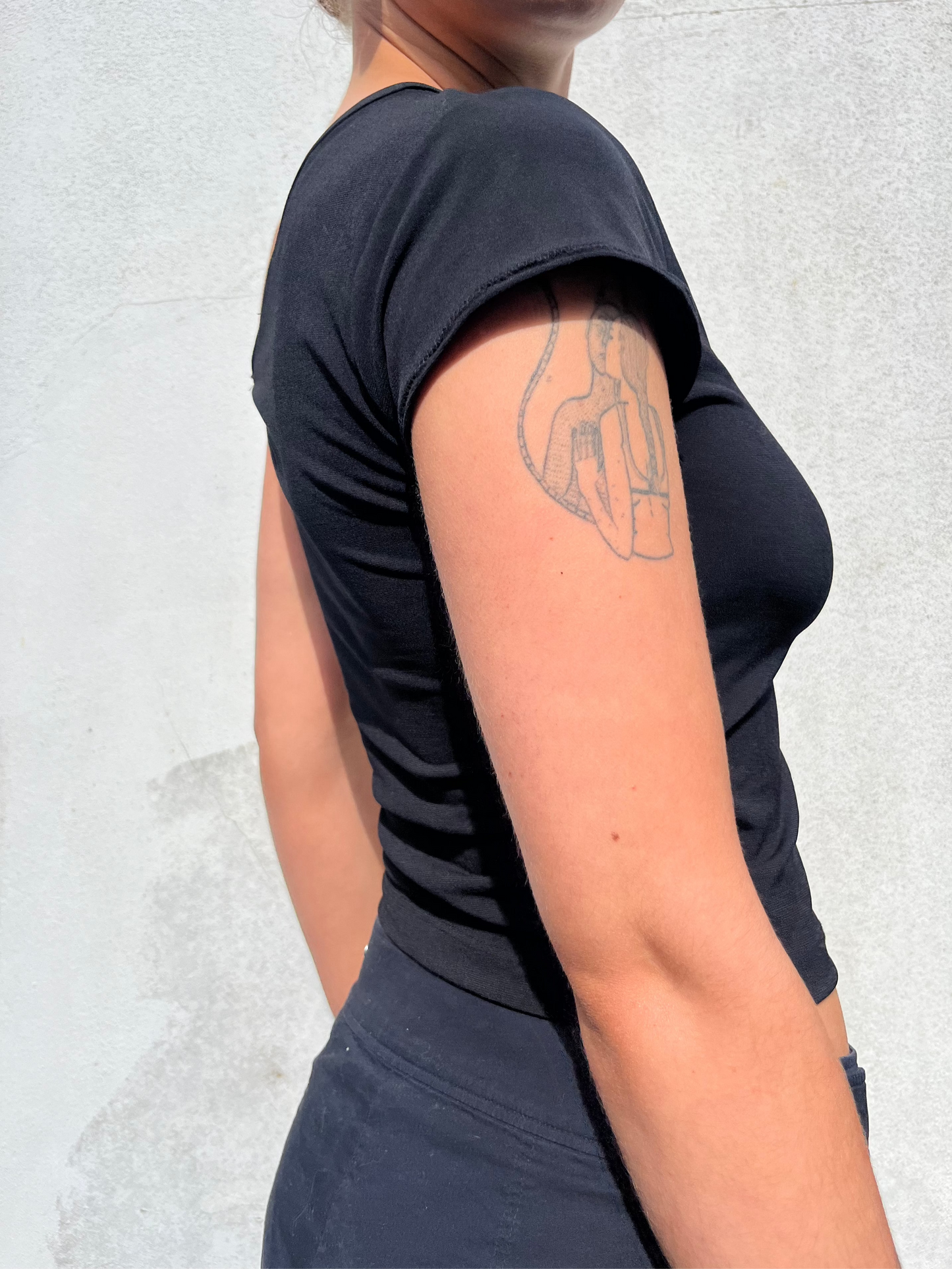 black slinky asymmetric top